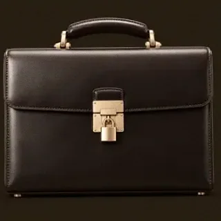 Locked leather briefcase — Kingmaker Casino